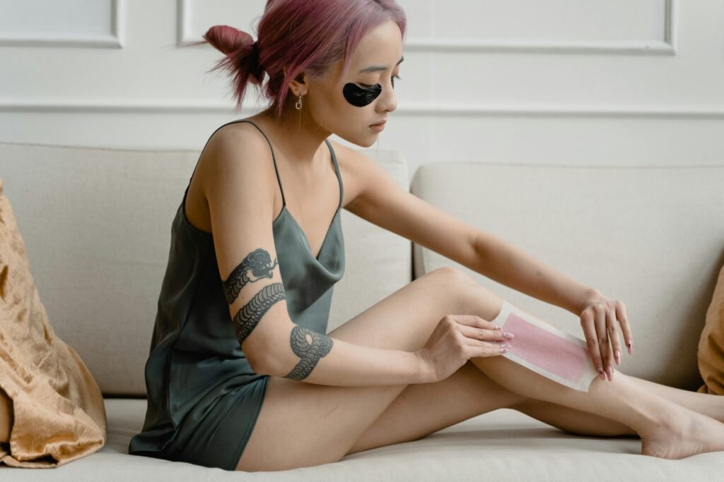 Waxing and Threading, waxing strip indoors, highlighting self-care in beauty salon